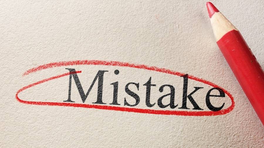 The word "mistake" printed on textured paper, circled in red colored pencil. 