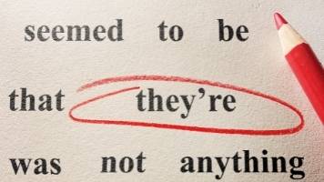 A homophonic error (the misuse of the word they're) is circled with a red colored pencil. 