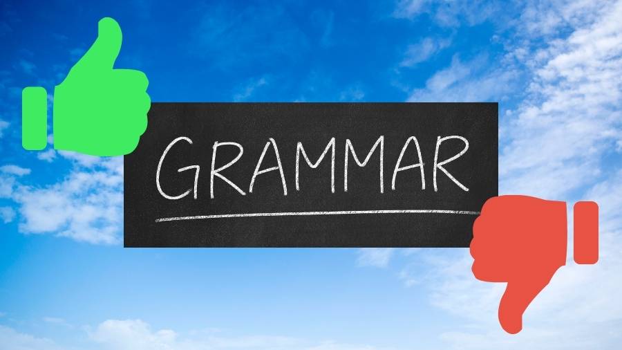 The word "Grammar" with a green thumbs-up on the left and a red thumbs-down on the right. 