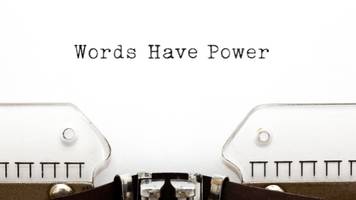 Someone typed the phrase "Words Have Power" on a typewriter. 