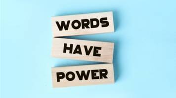 The message "Words Have Power" written on slips of paper. 